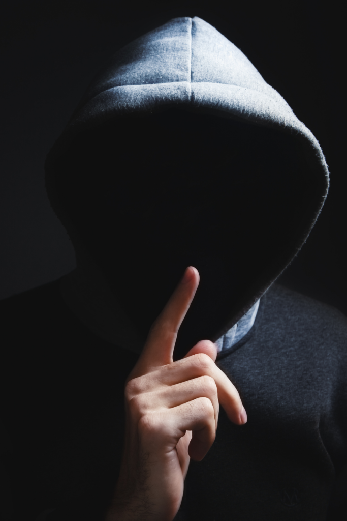 image of a guy in a hoodie signifying silence