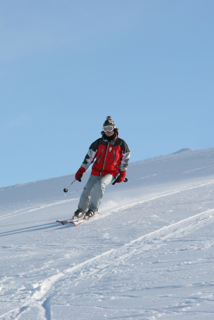 image of a guy skiing